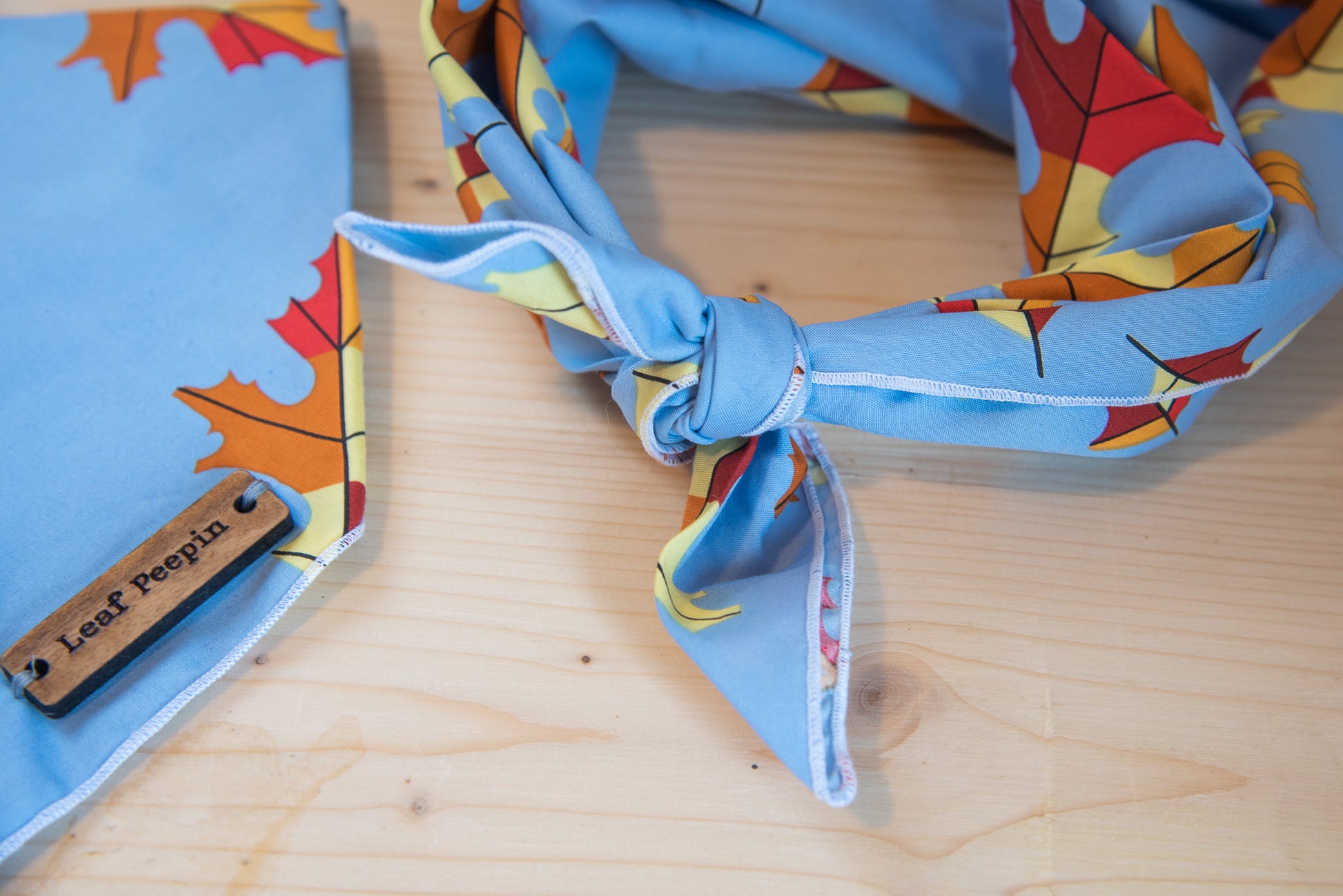 a pair of scissors sitting on a cutting board