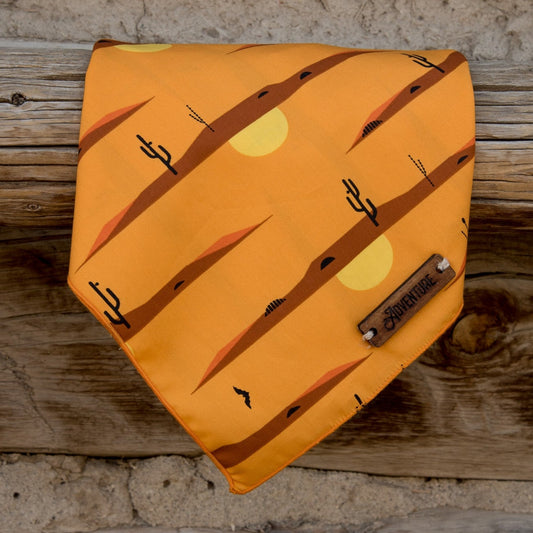 a close up of an open umbrella on a beach